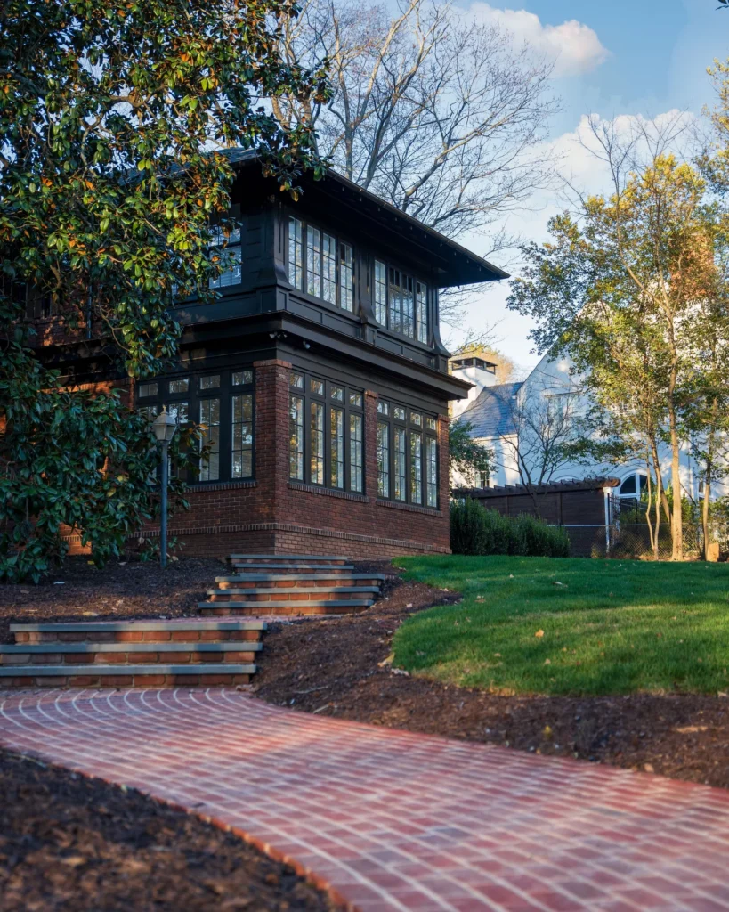 red brick house with pavers