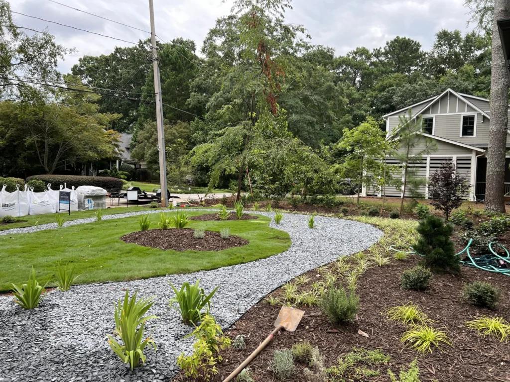 landscaping with gravel and bushes